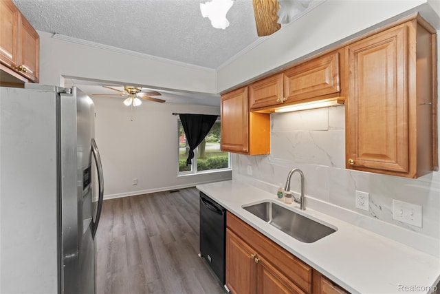 30542 Bretton St, Livonia, MI 48152 - kitchen featuring stainless steel fridge, a sink, black dishwasher, a ceiling fan, and light countertops