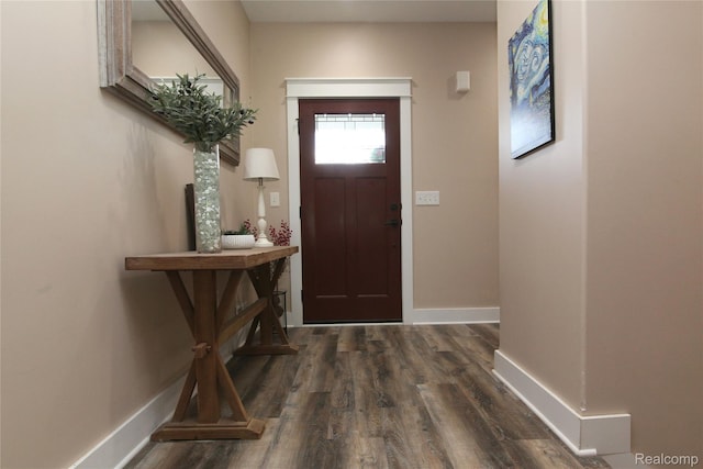1041 Lancaster St, Lapeer, MI 48446 - foyer entrance with dark wood-type flooring and baseboards
