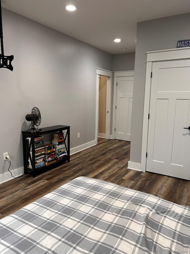 1041 Lancaster St, Lapeer, MI 48446 - unfurnished bedroom with recessed lighting, baseboards, and dark wood finished floors