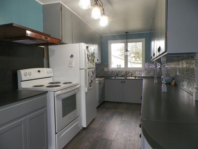 213 Cass St, Tustin, MI 49688 - kitchen with white electric stove, dark wood-style floors, backsplash, dark countertops, and a sink