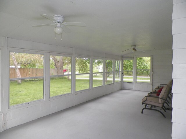 213 Cass St, Tustin, MI 49688 - unfurnished sunroom with a ceiling fan
