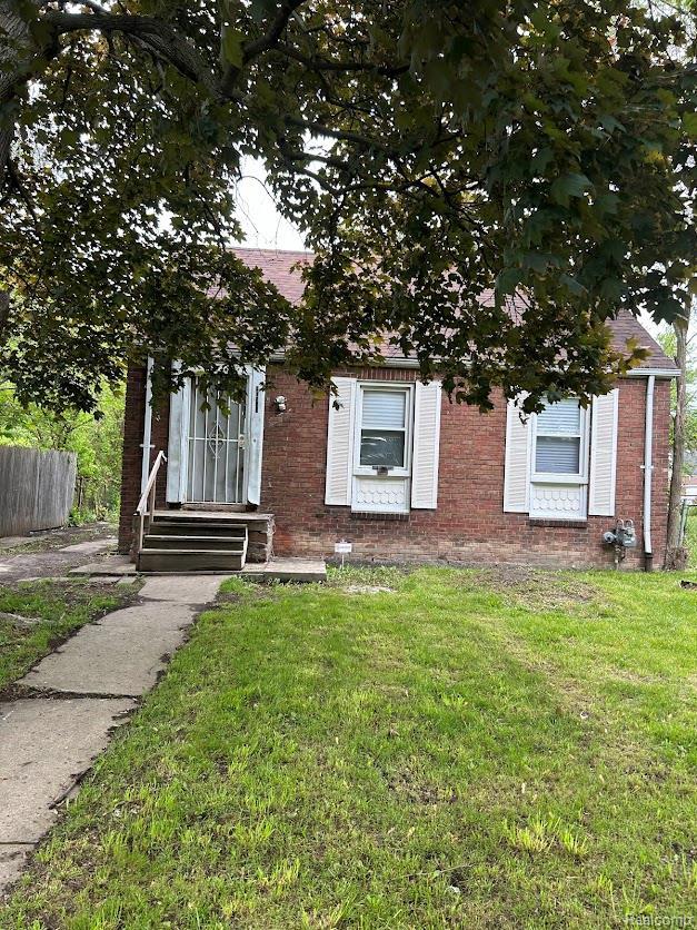 20554 Joann St, Detroit, MI 48205 - obstructed view of property with brick siding