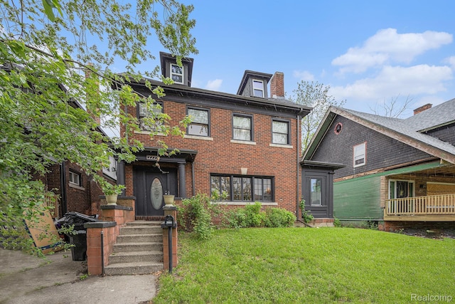 2223 S La Salle Gdns, Detroit, MI 48206 - view of front of house with a front lawn and brick siding
