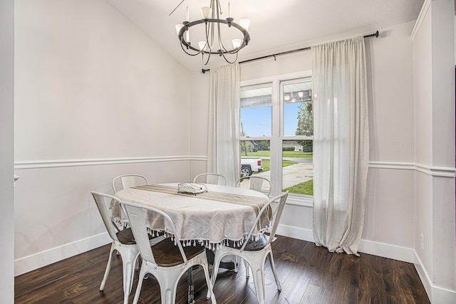 830 E Lyons St, Schoolcraft, MI 49087 - dining room with a chandelier, baseboards, dark wood-type flooring, and vaulted ceiling