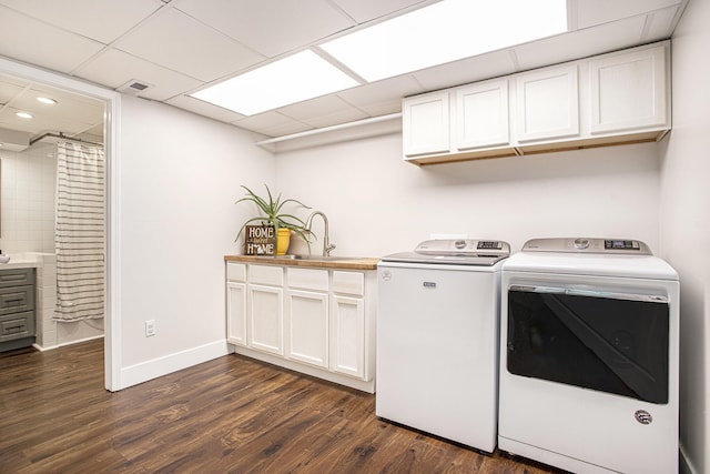 830 E Lyons St, Schoolcraft, MI 49087 - washroom featuring cabinet space, washer and clothes dryer, dark wood-style floors, baseboards, and recessed lighting