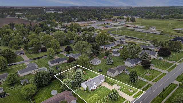 830 E Lyons St, Schoolcraft, MI 49087 - aerial perspective of suburban area featuring property boundaries highlighted and a tree filled landscape