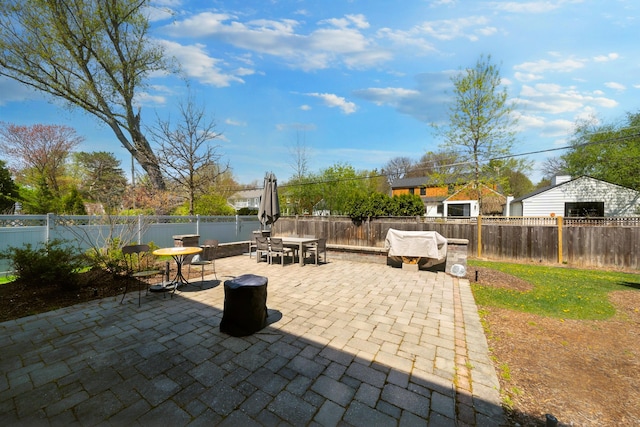1655 Dorchester Rd, Birmingham, MI 48009 - fenced backyard with outdoor dining space and a patio