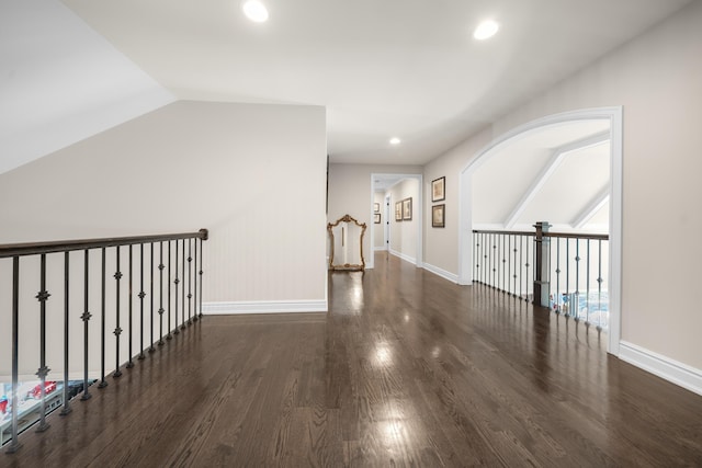1655 Dorchester Rd, Birmingham, MI 48009 - hallway with wood finished floors, baseboards, recessed lighting, and lofted ceiling
