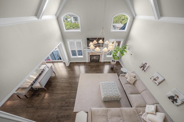1655 Dorchester Rd, Birmingham, MI 48009 - living area with high vaulted ceiling, plenty of natural light, dark wood finished floors, beam ceiling, and a chandelier
