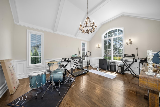 1655 Dorchester Rd, Birmingham, MI 48009 - exercise room featuring lofted ceiling, a wainscoted wall, wood finished floors, a chandelier, and a decorative wall