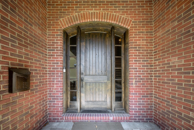 1655 Dorchester Rd, Birmingham, MI 48009 - property entrance featuring brick siding