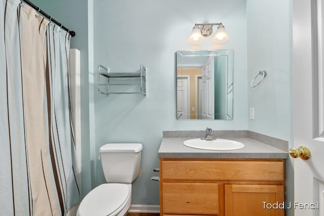 11081 Timberline Dr, Allendale, MI 49401 - full bath featuring vanity, toilet, and a shower with curtain
