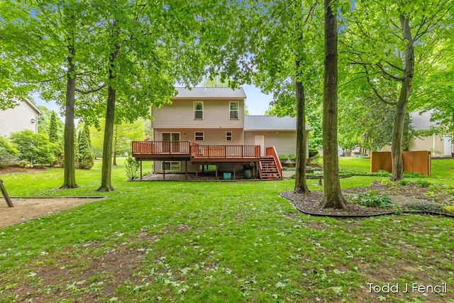 11081 Timberline Dr, Allendale, MI 49401 - rear view of house featuring a wooden deck, stairs, and a lawn