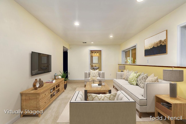 11081 Timberline Dr, Allendale, MI 49401 - living room featuring recessed lighting, baseboards, and light colored carpet