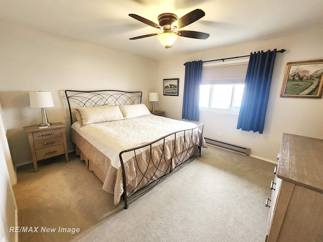 9135 Greenway Blvd, Saginaw, MI 48609 - bedroom with a baseboard heating unit, light colored carpet, a ceiling fan, and baseboards