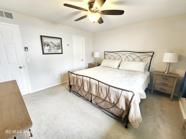 9135 Greenway Blvd, Saginaw, MI 48609 - carpeted bedroom with ceiling fan and baseboards