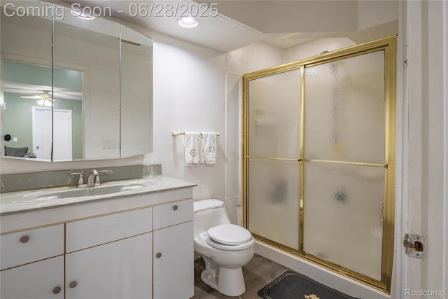 36426 Weideman St, Clinton Township, MI 48035 - bathroom with vanity, a shower stall, and a ceiling fan