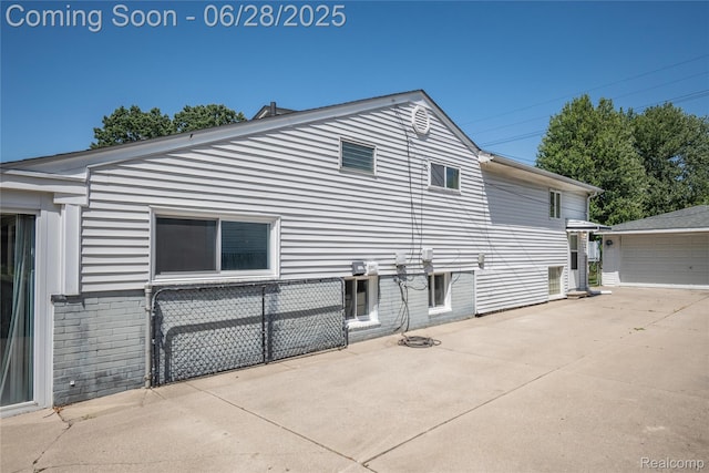 36426 Weideman St, Clinton Township, MI 48035 - view of home's exterior featuring brick siding
