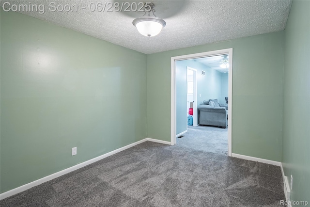 36426 Weideman St, Clinton Township, MI 48035 - spare room featuring a textured ceiling and carpet