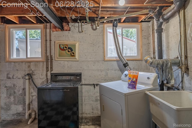 36426 Weideman St, Clinton Township, MI 48035 - washroom featuring washing machine and clothes dryer and plenty of natural light