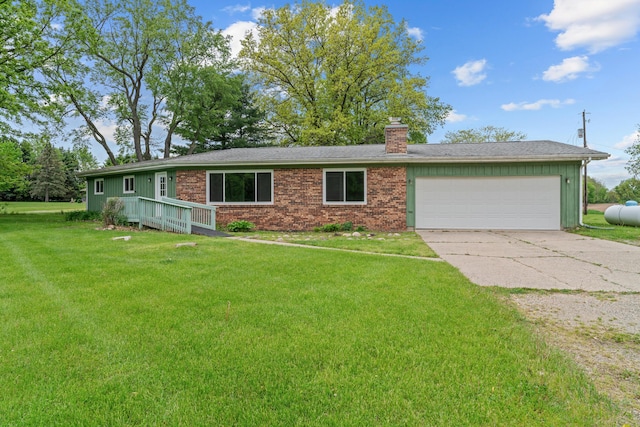 7060 Dobson Rd, Jonesville, MI 49250 - ranch-style house with a chimney, a front yard, concrete driveway, an attached garage, and brick siding