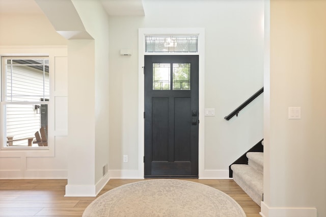 8460 Woodridge Dr, Davison, MI 48423 - foyer entrance with light wood-style floors and stairs