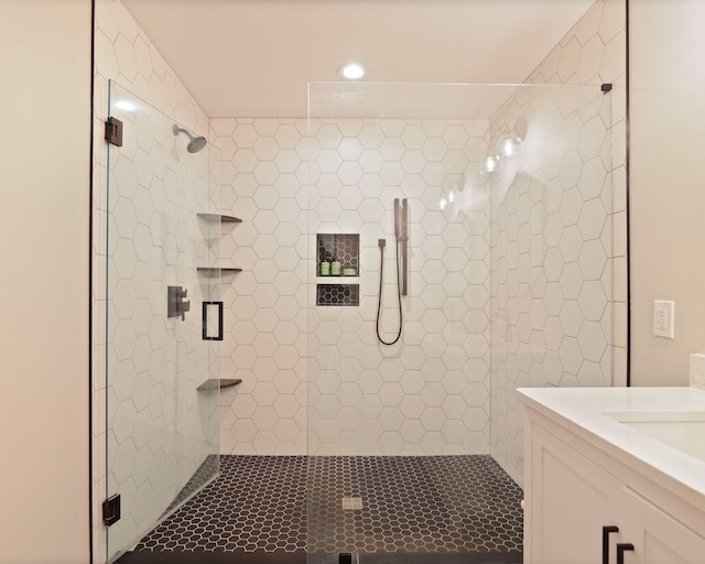 8460 Woodridge Dr, Davison, MI 48423 - bathroom with vanity, a stall shower, and recessed lighting