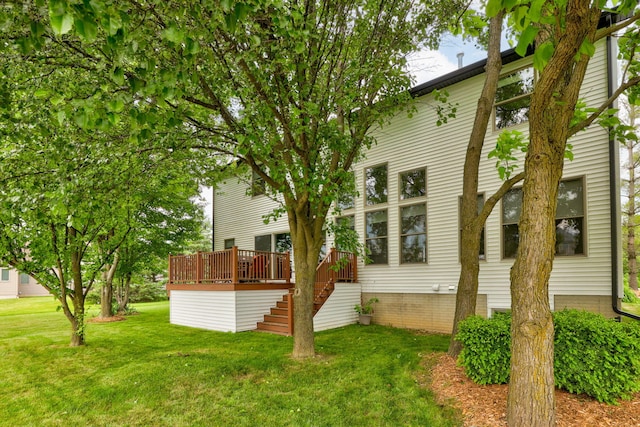 8460 Woodridge Dr, Davison, MI 48423 - rear view of house with stairway, a yard, and a deck