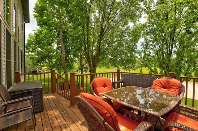 8460 Woodridge Dr, Davison, MI 48423 - wooden deck with outdoor dining area and view of wooded area