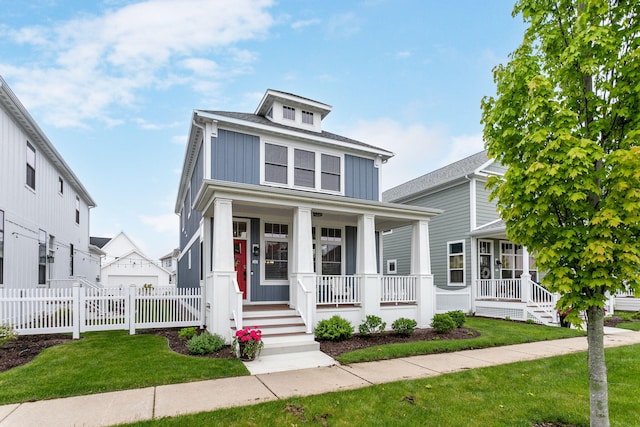 245 Cavelier Ave, Saint Joseph, MI 49085 - traditional style home with a porch and board and batten siding