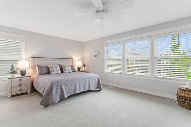 245 Cavelier Ave, Saint Joseph, MI 49085 - carpeted bedroom with baseboards and ceiling fan