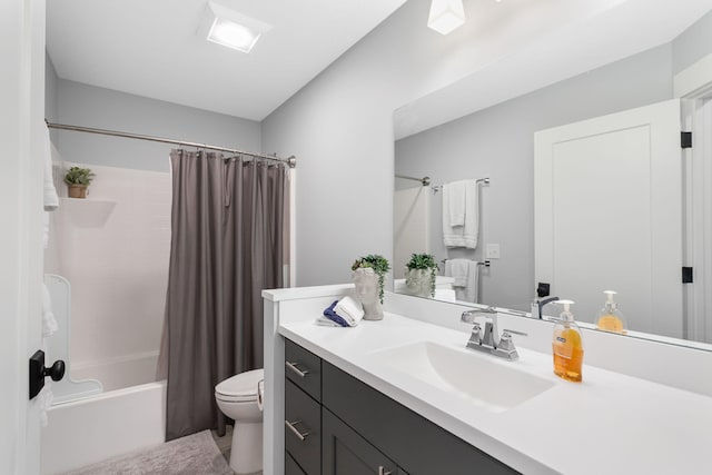 245 Cavelier Ave, Saint Joseph, MI 49085 - bathroom featuring toilet, vanity, and shower / bath combination with curtain