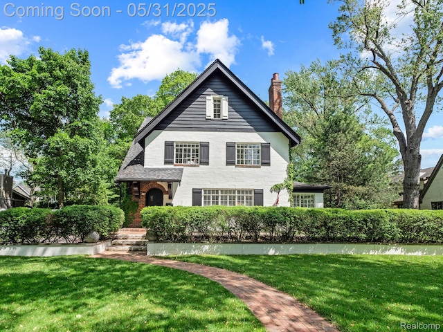 822 Suffield Ave, Birmingham, MI 48009 - english style home featuring a front lawn and a chimney