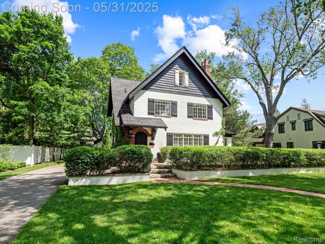 822 Suffield Ave, Birmingham, MI 48009 - tudor house featuring a chimney