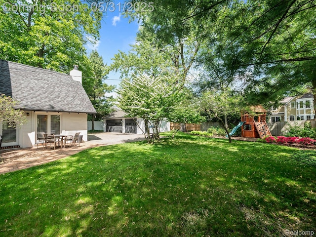 822 Suffield Ave, Birmingham, MI 48009 - view of yard featuring a playground and a patio area