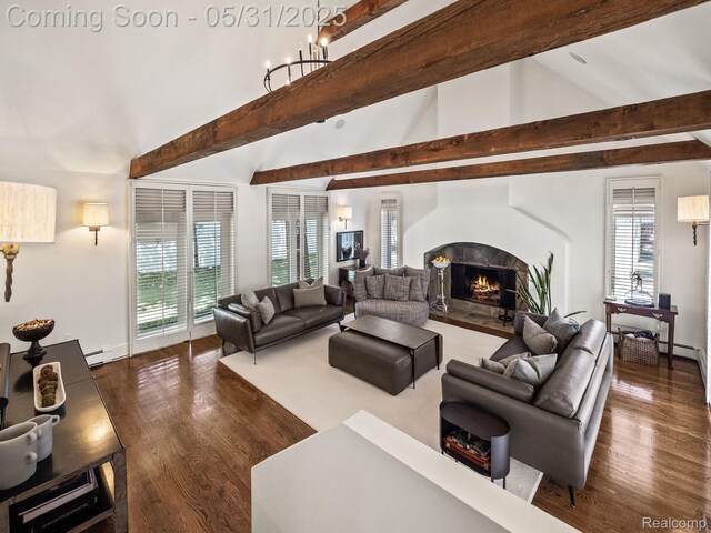 822 Suffield Ave, Birmingham, MI 48009 - living area featuring a warm lit fireplace, healthy amount of natural light, and wood finished floors