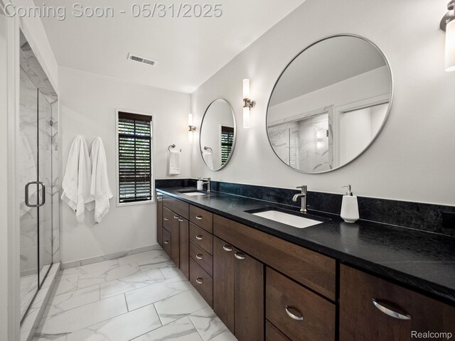 822 Suffield Ave, Birmingham, MI 48009 - full bathroom featuring marble finish floors, double vanity, baseboards, and a shower stall