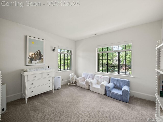 822 Suffield Ave, Birmingham, MI 48009 - living area featuring dark carpet and baseboards