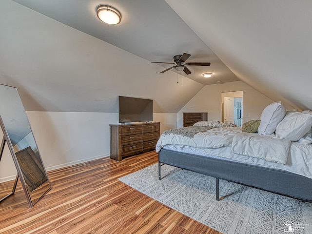 691 Foxworth St, Dundee, MI 48131 - bedroom with light wood-type flooring, lofted ceiling, baseboards, and a ceiling fan