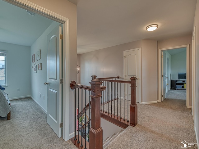 691 Foxworth St, Dundee, MI 48131 - hall featuring an upstairs landing, carpet, and baseboards