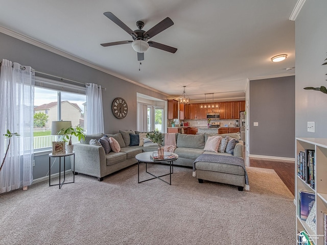 691 Foxworth St, Dundee, MI 48131 - living area with ornamental molding, ceiling fan, baseboards, and a chandelier
