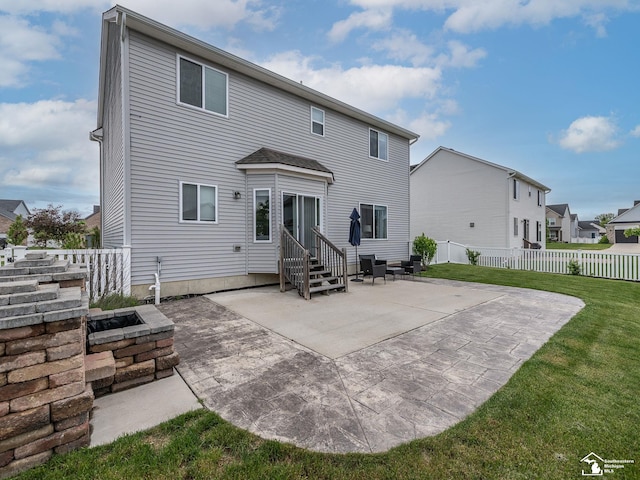 691 Foxworth St, Dundee, MI 48131 - back of house with entry steps and a patio area