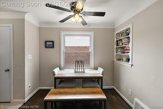 2111 Ellwood Ave, Berkley, MI 48072 - dining space with dark wood finished floors, a ceiling fan, and crown molding