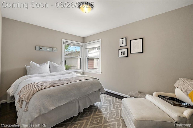2111 Ellwood Ave, Berkley, MI 48072 - bedroom featuring baseboards and dark wood-type flooring