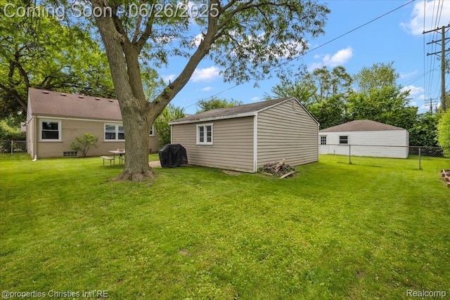 2111 Ellwood Ave, Berkley, MI 48072 - fenced backyard with an outdoor structure