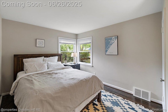 2111 Ellwood Ave, Berkley, MI 48072 - bedroom featuring baseboards and dark wood-type flooring