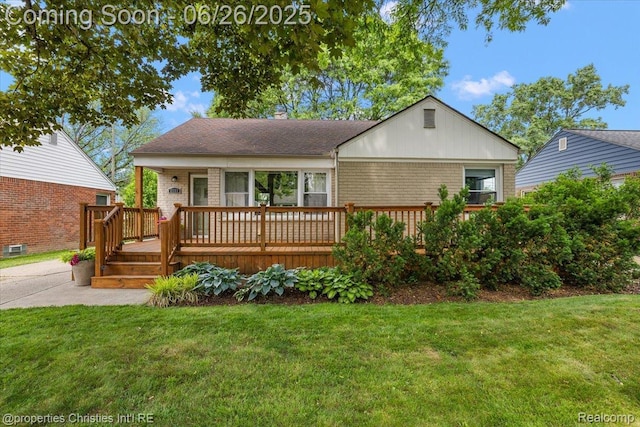 2111 Ellwood Ave, Berkley, MI 48072 - view of front of house featuring brick siding, a front yard, and a wooden deck