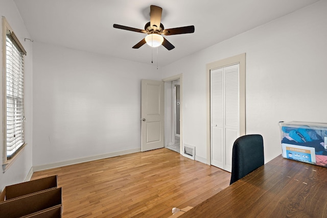 17270 Taft Rd, Spring Lake, MI 49456 - unfurnished office featuring a ceiling fan, light wood-style floors, and baseboards