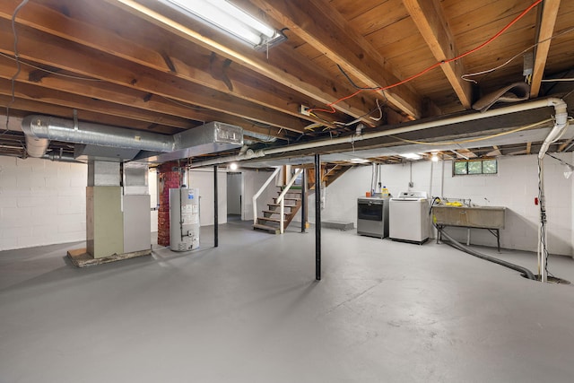 17270 Taft Rd, Spring Lake, MI 49456 - basement with water heater, washing machine and dryer, heating unit, stairway, and a sink