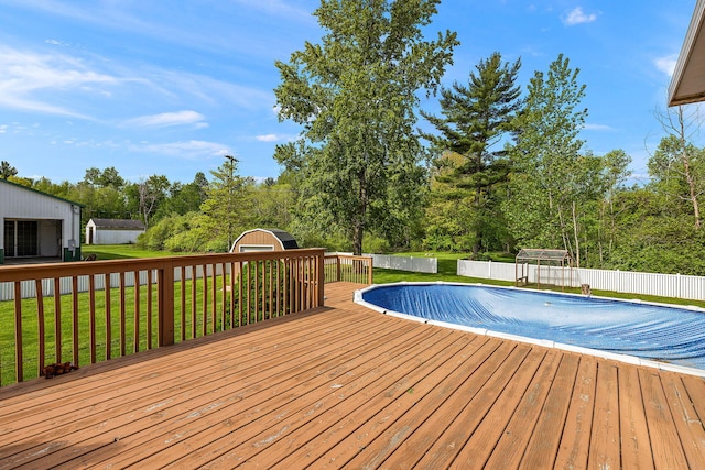 17270 Taft Rd, Spring Lake, MI 49456 - view of swimming pool featuring a deck